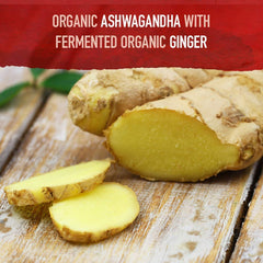Garden of Life organic ashwagandha supplement UAE label showing fermented organic ginger root slices on wooden board