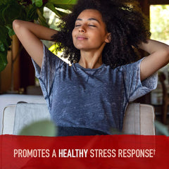 Garden of Life relaxed woman reclining on couch promoting stress relief with organic ashwagandha supplement UAE