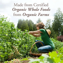 Garden of Life organic B12 spray UAE image of woman harvesting organic whole foods on a farm