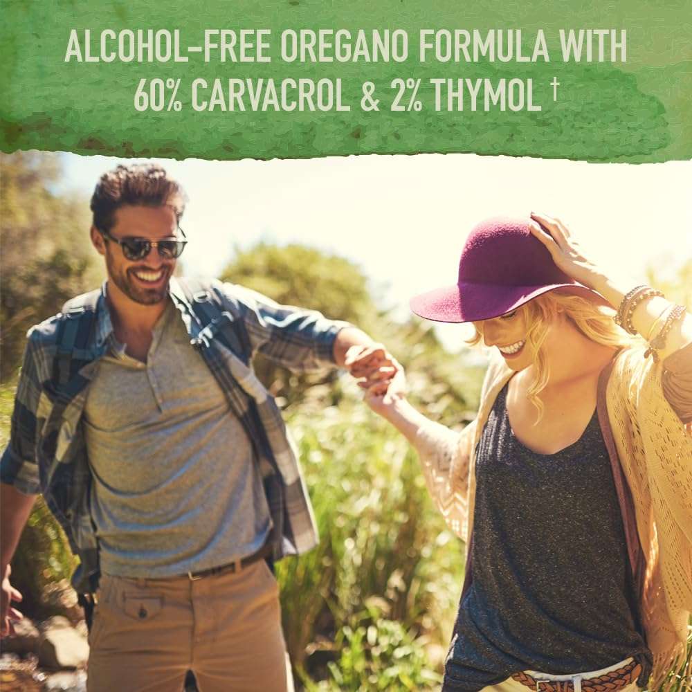 Garden of Life organic oil of oregano supplement label showing alcohol free formula and happy couple outdoors