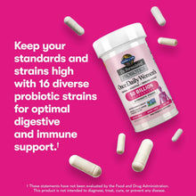 Women’s probiotic bottle with capsules floating around it, 16 probiotic strains, 50 billion CFU.