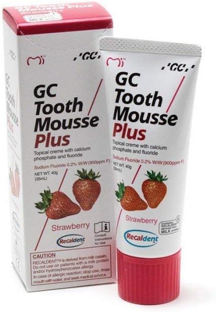 GC Tooth Mousse Plus Strawberry tube and box with fresh strawberry images topical dental cream