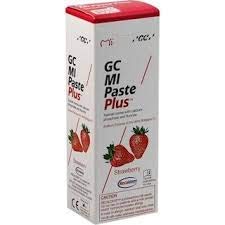 Box of GC Tooth Mousse Plus Strawberry flavor dental paste showing strawberries on white and red packaging