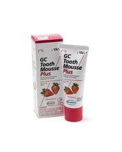 GC Tooth Mousse Plus strawberry topical cream tube and carton, red cap.