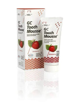 GC Tooth Mousse strawberry tube and box, white packaging with red strawberry illustrations