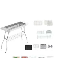Portable charcoal grill with side rack and included BBQ tool accessories