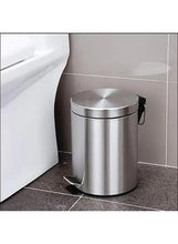 Stainless steel pedal waste bin with opened lid and step pedal at the base