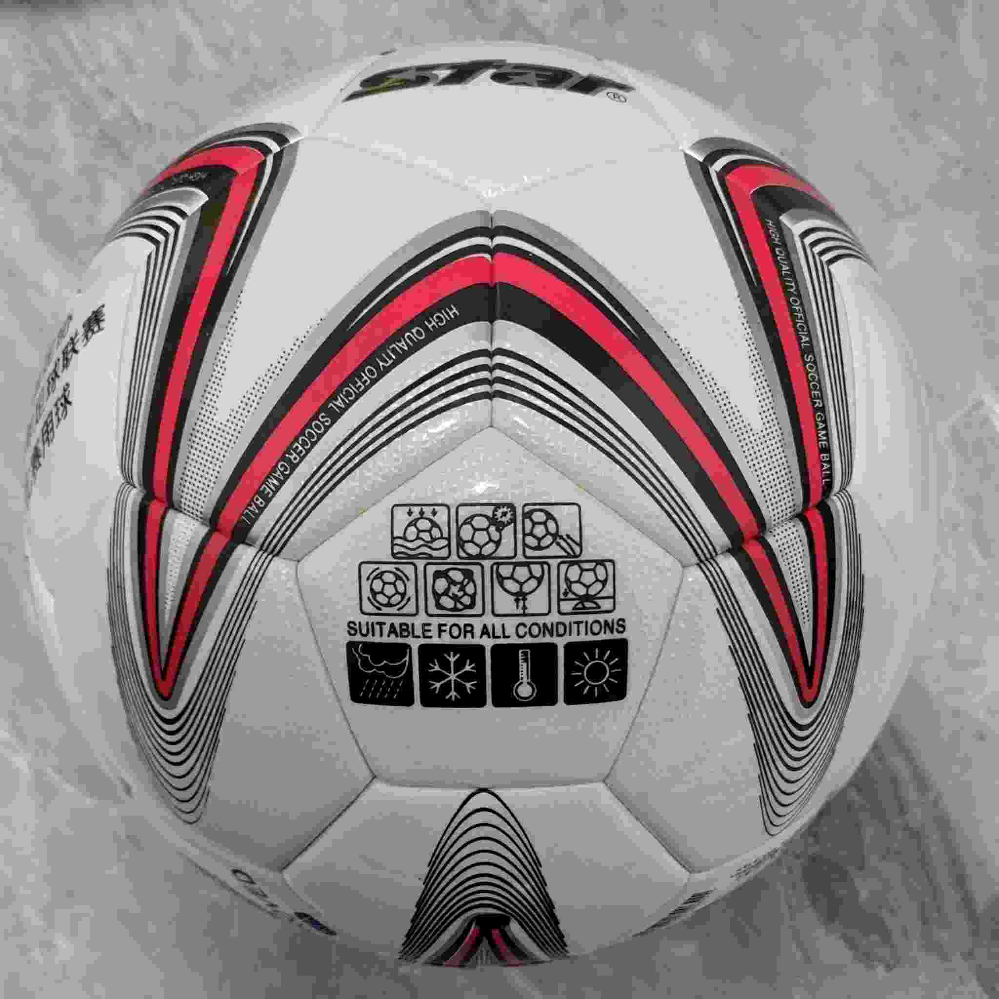 Huitich 3D effect soccer ball in white with red and black geometric designs suitable for all conditions