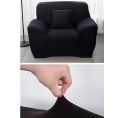 Black elastic sofa cover on armchair showing stretchable fabric close-up by Huitich