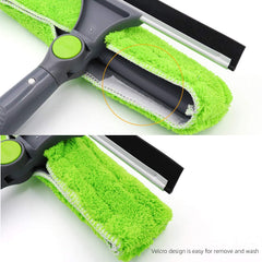 Close-up of rotating head glass cleaner with green microfiber cloth and squeegee blade for easy cleaning