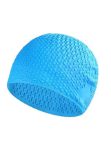 Blue silicone swim cap with textured surface, curved fit for long hair