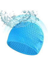 Blue silicone swim cap with textured pattern and curved brim