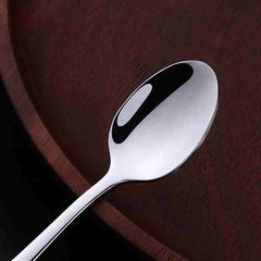 Huitich stainless steel espresso spoons set featuring a polished coffee spoon on a dark brown surface