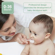 Baby oral cleaner with white brush head being used on infant mouth