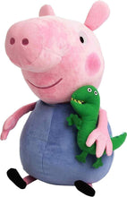 Pink plush pig doll in blue outfit with green dinosaur on shoulder, soft toy.