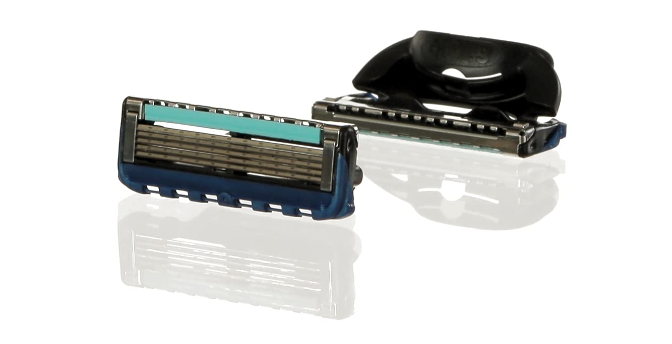 Two replacement razor cartridges on white background Gillette Fusion razor blades 8 pack showing blades and lubricating strip