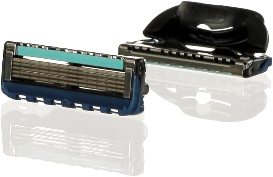 Gillette Fusion razor blades 8 pack product image showing two replacement cartridges close up with lubricating strip