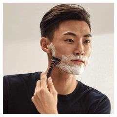 Man shaving with Gillette razor and lather demonstrating smooth shave using Gillette Fusion razor blades 8 pack