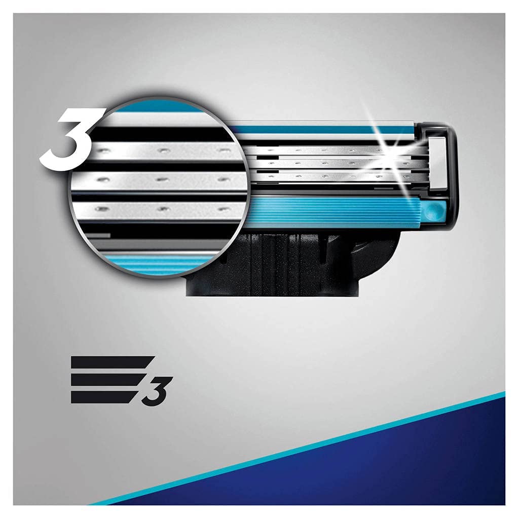 Gillette MACH 3 blades 4 pack close up of three blade razor cartridge with lubricating strip