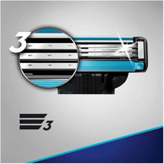 Close up of Gillette MACH 3 blades pack of 4 razor cartridge showing three blades and lubricating strip