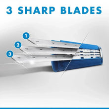 Close-up of three razor blades in a blue cartridge housing with silver edges