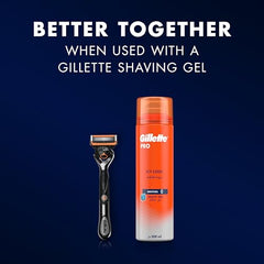 Gillette ProGlide5 Power Blades razor beside Gillette shaving gel can on blue background for smooth close shave