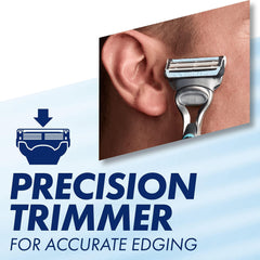 Close up of man using Gillette SkinGuard Sensitive razor blades precision trimmer to edge near ear