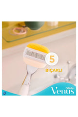 Close up of Gillette Venus Comfortglide razor for women. White handle with yellow lubrication strip and five blades