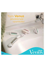 Gillette Venus razor handle with blade cartridges and refill pack