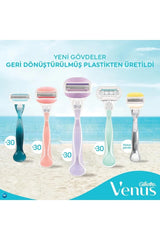 Gillette Venus Comfortglide razor for women pastel handle set of five displayed on a beach background