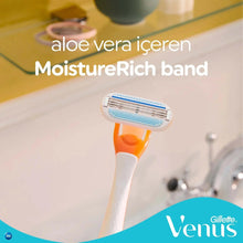 Women’s disposable razor with blue MoistureRich band on orange handle and 3-blade head