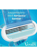 Gillette Venus 3-blade razor cartridge with protective guard and blue dots