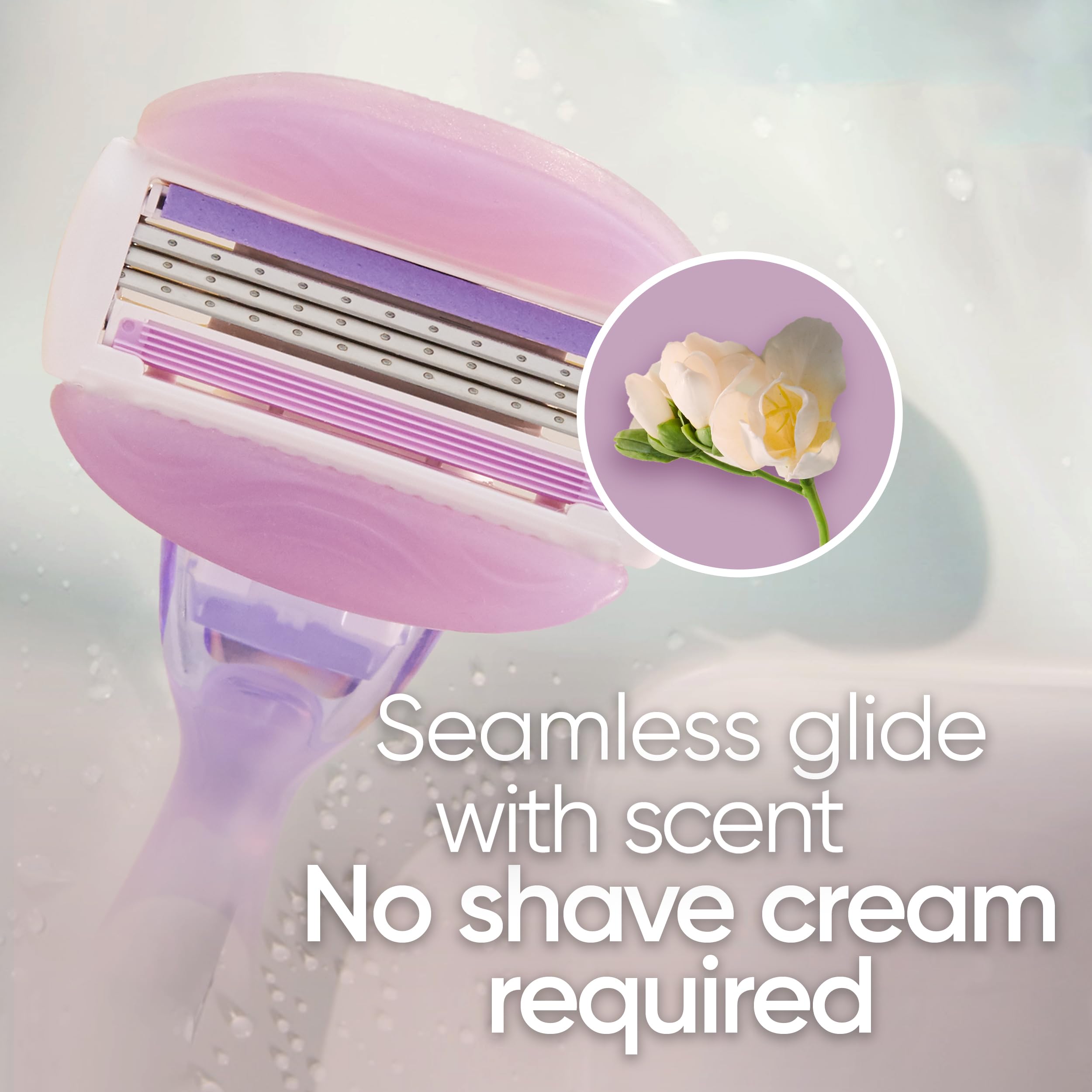 Close up pink Gillette Venus razor head with moisturizing strip and flower scent circle Venus razor blade refills for women