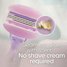 Venus razor blade cartridge with 3 blades, shown in close-up on pink base