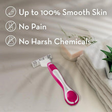Pink disposable women’s razor lying on countertop