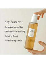 Ginseng Cleansing Oil 210ml bottle with pump and hands, key features text on image