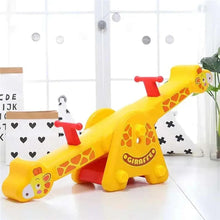 Yellow plastic giraffe rocking toy with red pegs and smiling face detail