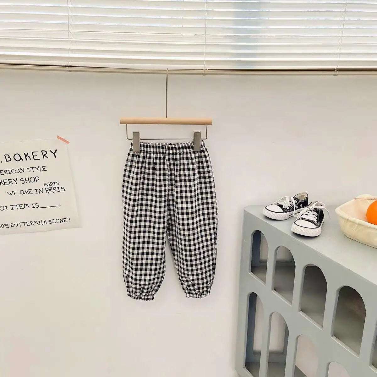 Mumzar girls plaid summer pants with black and white checkered pattern, perfect for warm weather wear