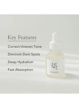 Skincare serum bottle with dropper beside key-features list