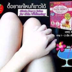 Gluta Berry whitening drink product box beside pale legs and hand showing skin whitening result