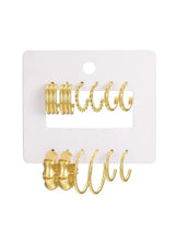 Gold-tone hoop earrings set with six mixed styles on display card
