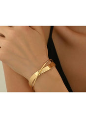 Huitich gold alloy bracelet and ring set worn on wrist with elegant overlapping design