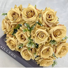 Huitich gold artificial flower decor featuring realistic yellow roses arranged with green leaves
