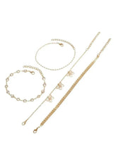 Gold butterfly anklet set: four chain anklets with butterfly charms and clasps