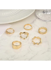 Gold chunky statement ring set featuring various designs for stylish stacking options