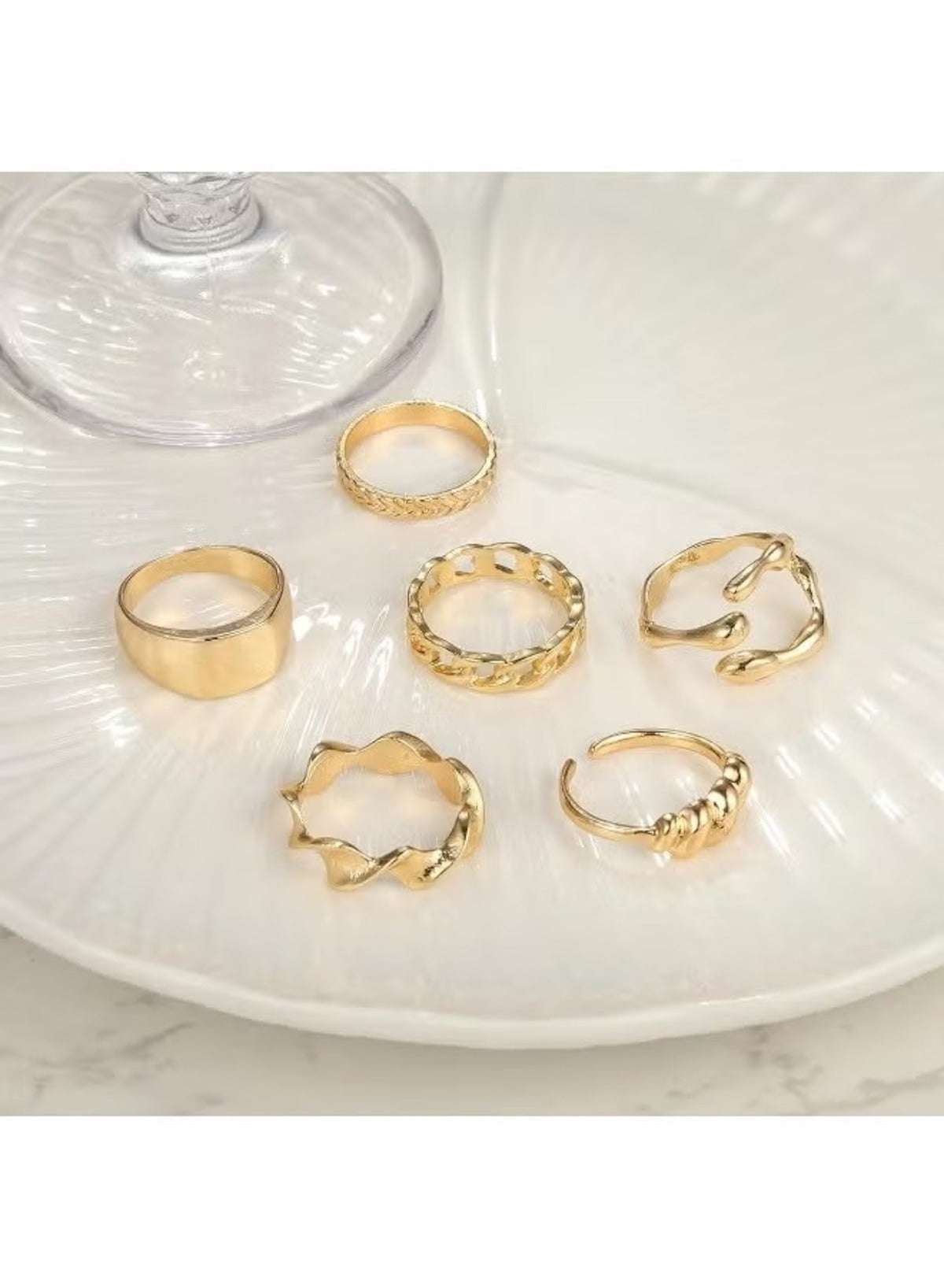 Gold chunky statement ring set featuring six unique styles, perfect for layered looks on any occasion