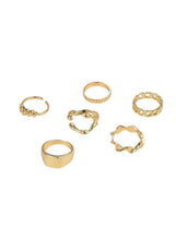 Gold tone chunky statement ring set with five geometric rings, laid flat