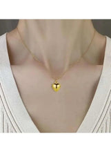 Gold heart pendant necklace with heart charm on fine chain