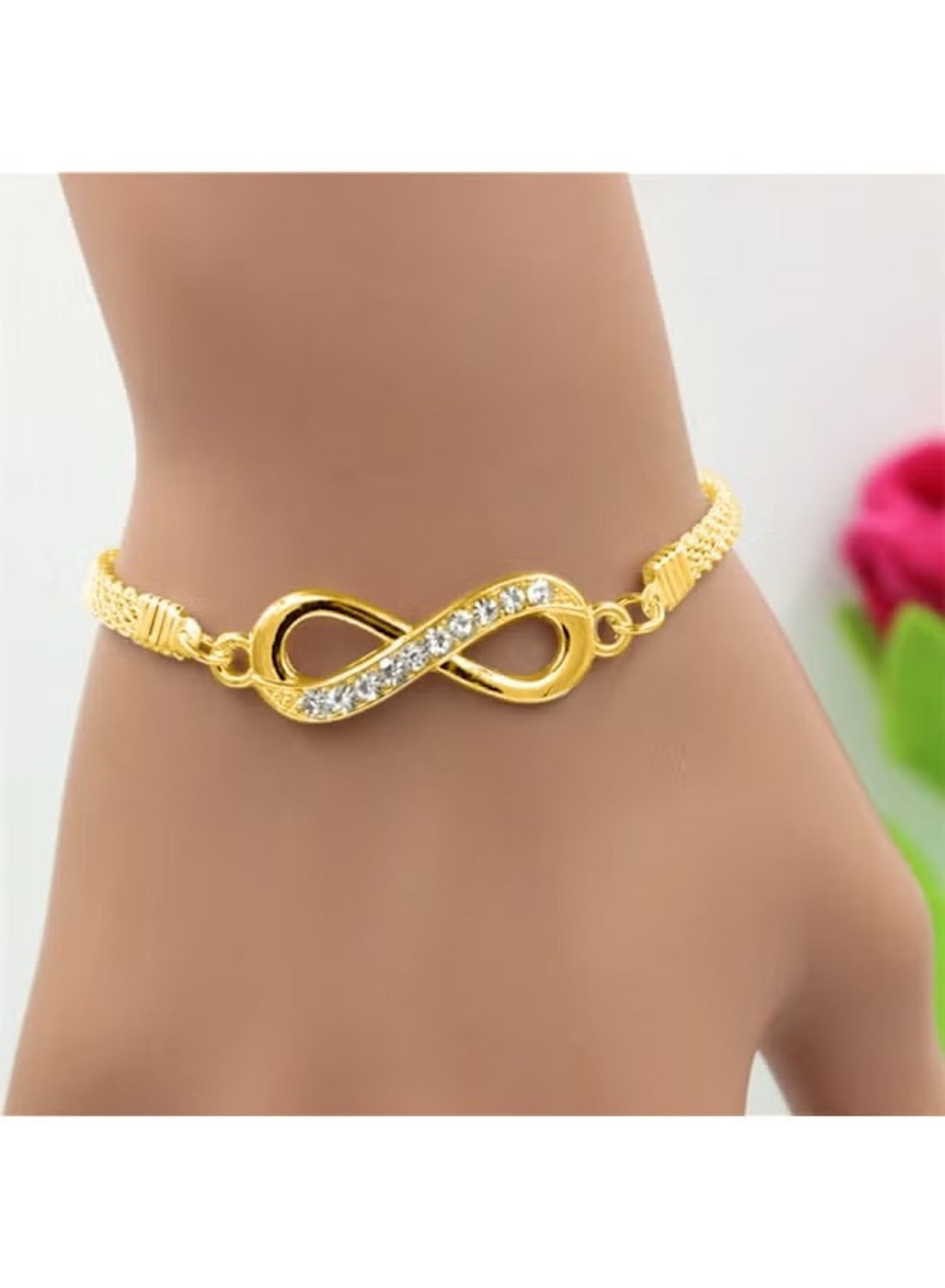Gold infinity mesh bracelet for women featuring a shimmering infinity design with rhinestones