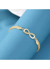 Gold mesh bracelet with infinity link center and crystal accents, adjustable chain